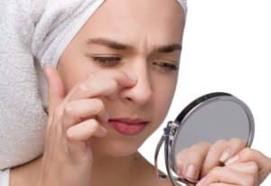 The surgical technique used during rhinoplasty, such as adding cartilage or altering the nasal structure, can also contribute to temporary changes in the size and shape of the nose post-surgery.