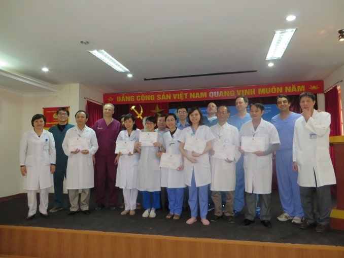 residents and professors in their auditorium