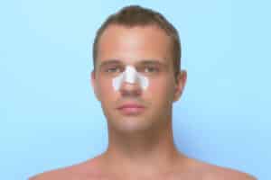 A patient looking forward to improved facial features after their revision surgery in Miami, FL.