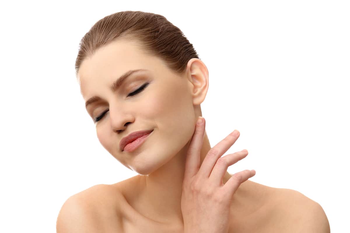 An otoplasty patient considering the details of cosmetic ear surgery - otoplasty from a board-certified plastic surgeon in Miami, FL.