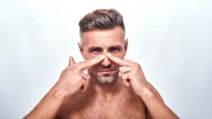 Enhance masculine features with Dr. Andres Bustillo's men's rhinoplasty, ensuring natural, culturally sensitive, confident outcomes.