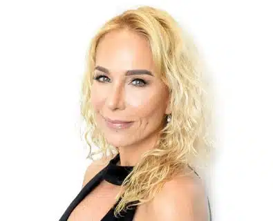 Woman showing beautiful brows after a brow lift in Miami.