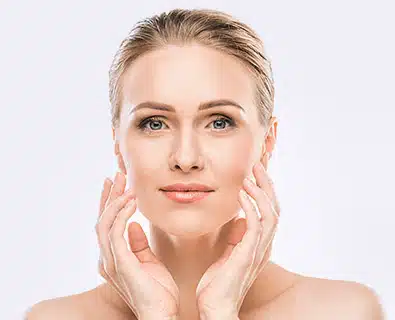 Happy woman after Botox procedure in Miami.