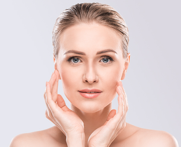 Happy woman after Botox procedure in Miami.